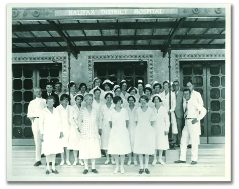 Hospital staff gather for a group photograph.