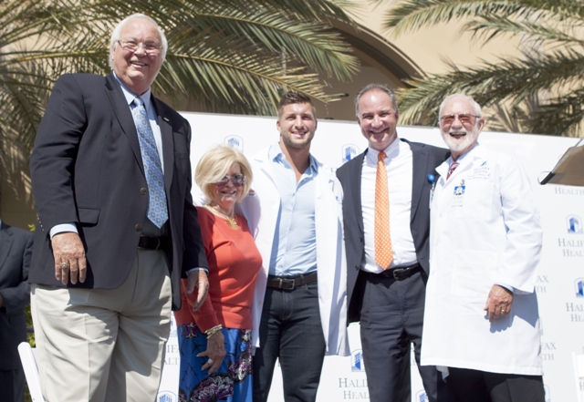 Photo of TIm Tebow and Halifax Health Team Members.