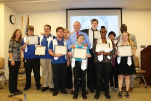 Project SEARCH students with diplomas
