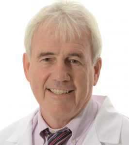 Headshot of Dr. Neil Oslos