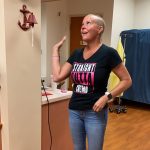 Jennifer ringing her 1st bell after finishing chemotherapy.